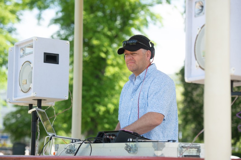 DJ mid set in the sun.